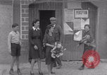Image of woman welcomes Free French troops with flowers La Haye Du Puits France, 1944, second 48 stock footage video 65675079343