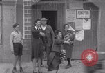 Image of woman welcomes Free French troops with flowers La Haye Du Puits France, 1944, second 49 stock footage video 65675079343