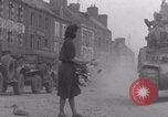 Image of woman welcomes Free French troops with flowers La Haye Du Puits France, 1944, second 51 stock footage video 65675079343