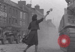 Image of woman welcomes Free French troops with flowers La Haye Du Puits France, 1944, second 53 stock footage video 65675079343