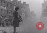 Image of woman welcomes Free French troops with flowers La Haye Du Puits France, 1944, second 57 stock footage video 65675079343