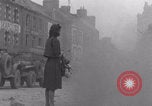 Image of woman welcomes Free French troops with flowers La Haye Du Puits France, 1944, second 58 stock footage video 65675079343