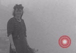 Image of woman welcomes Free French troops with flowers La Haye Du Puits France, 1944, second 62 stock footage video 65675079343