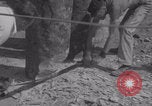 Image of Avranches France men remove roadblocks WW2 Avranches France, 1944, second 22 stock footage video 65675079345