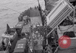 Image of truck lifted to landing craft WW2 France, 1944, second 6 stock footage video 65675079352