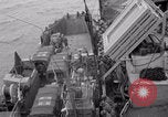 Image of truck lifted to landing craft WW2 France, 1944, second 7 stock footage video 65675079352