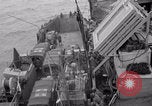 Image of truck lifted to landing craft WW2 France, 1944, second 9 stock footage video 65675079352