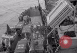 Image of truck lifted to landing craft WW2 France, 1944, second 11 stock footage video 65675079352