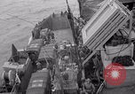 Image of truck lifted to landing craft WW2 France, 1944, second 14 stock footage video 65675079352