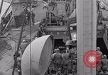 Image of truck lifted to landing craft WW2 France, 1944, second 17 stock footage video 65675079352