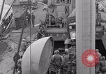 Image of truck lifted to landing craft WW2 France, 1944, second 18 stock footage video 65675079352