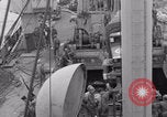 Image of truck lifted to landing craft WW2 France, 1944, second 20 stock footage video 65675079352