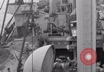 Image of truck lifted to landing craft WW2 France, 1944, second 22 stock footage video 65675079352