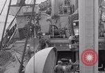 Image of truck lifted to landing craft WW2 France, 1944, second 23 stock footage video 65675079352