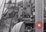 Image of truck lifted to landing craft WW2 France, 1944, second 24 stock footage video 65675079352