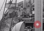 Image of truck lifted to landing craft WW2 France, 1944, second 25 stock footage video 65675079352