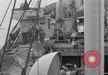 Image of truck lifted to landing craft WW2 France, 1944, second 26 stock footage video 65675079352