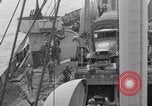 Image of truck lifted to landing craft WW2 France, 1944, second 27 stock footage video 65675079352