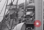 Image of truck lifted to landing craft WW2 France, 1944, second 28 stock footage video 65675079352
