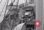 Image of truck lifted to landing craft WW2 France, 1944, second 29 stock footage video 65675079352