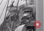 Image of truck lifted to landing craft WW2 France, 1944, second 30 stock footage video 65675079352