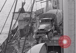 Image of truck lifted to landing craft WW2 France, 1944, second 31 stock footage video 65675079352