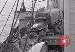 Image of truck lifted to landing craft WW2 France, 1944, second 34 stock footage video 65675079352