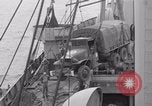 Image of truck lifted to landing craft WW2 France, 1944, second 35 stock footage video 65675079352
