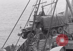 Image of truck lifted to landing craft WW2 France, 1944, second 44 stock footage video 65675079352