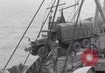 Image of truck lifted to landing craft WW2 France, 1944, second 45 stock footage video 65675079352