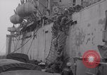Image of Free French depart landing craft to Cherbourg France, 1944, second 10 stock footage video 65675079354