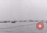 Image of Free French depart landing craft to Cherbourg France, 1944, second 37 stock footage video 65675079354