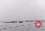 Image of Free French depart landing craft to Cherbourg France, 1944, second 39 stock footage video 65675079354