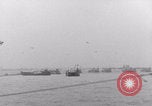 Image of Free French depart landing craft to Cherbourg France, 1944, second 40 stock footage video 65675079354