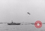 Image of Free French depart landing craft to Cherbourg France, 1944, second 42 stock footage video 65675079354