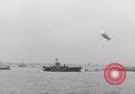 Image of Free French depart landing craft to Cherbourg France, 1944, second 45 stock footage video 65675079354