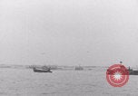 Image of Free French depart landing craft to Cherbourg France, 1944, second 53 stock footage video 65675079354