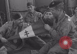 Image of Free French soldiers with civilians Normandy Foucarville France, 1944, second 12 stock footage video 65675079361
