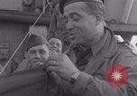Image of Free French soldiers with civilians Normandy Foucarville France, 1944, second 17 stock footage video 65675079361