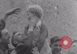 Image of Free French soldiers with civilians Normandy Foucarville France, 1944, second 32 stock footage video 65675079361