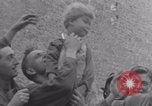 Image of Free French soldiers with civilians Normandy Foucarville France, 1944, second 33 stock footage video 65675079361
