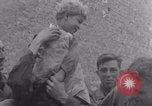 Image of Free French soldiers with civilians Normandy Foucarville France, 1944, second 35 stock footage video 65675079361