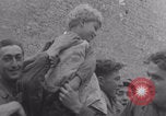 Image of Free French soldiers with civilians Normandy Foucarville France, 1944, second 36 stock footage video 65675079361