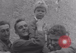 Image of Free French soldiers with civilians Normandy Foucarville France, 1944, second 40 stock footage video 65675079361