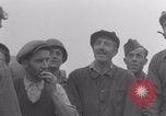 Image of Free French soldiers with civilians Normandy Foucarville France, 1944, second 42 stock footage video 65675079361