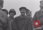 Image of Free French soldiers with civilians Normandy Foucarville France, 1944, second 46 stock footage video 65675079361