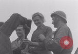 Image of Free French soldiers with civilians Normandy Foucarville France, 1944, second 49 stock footage video 65675079361