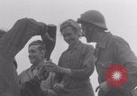Image of Free French soldiers with civilians Normandy Foucarville France, 1944, second 50 stock footage video 65675079361