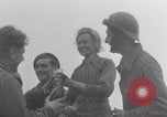 Image of Free French soldiers with civilians Normandy Foucarville France, 1944, second 51 stock footage video 65675079361