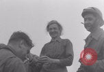Image of Free French soldiers with civilians Normandy Foucarville France, 1944, second 53 stock footage video 65675079361